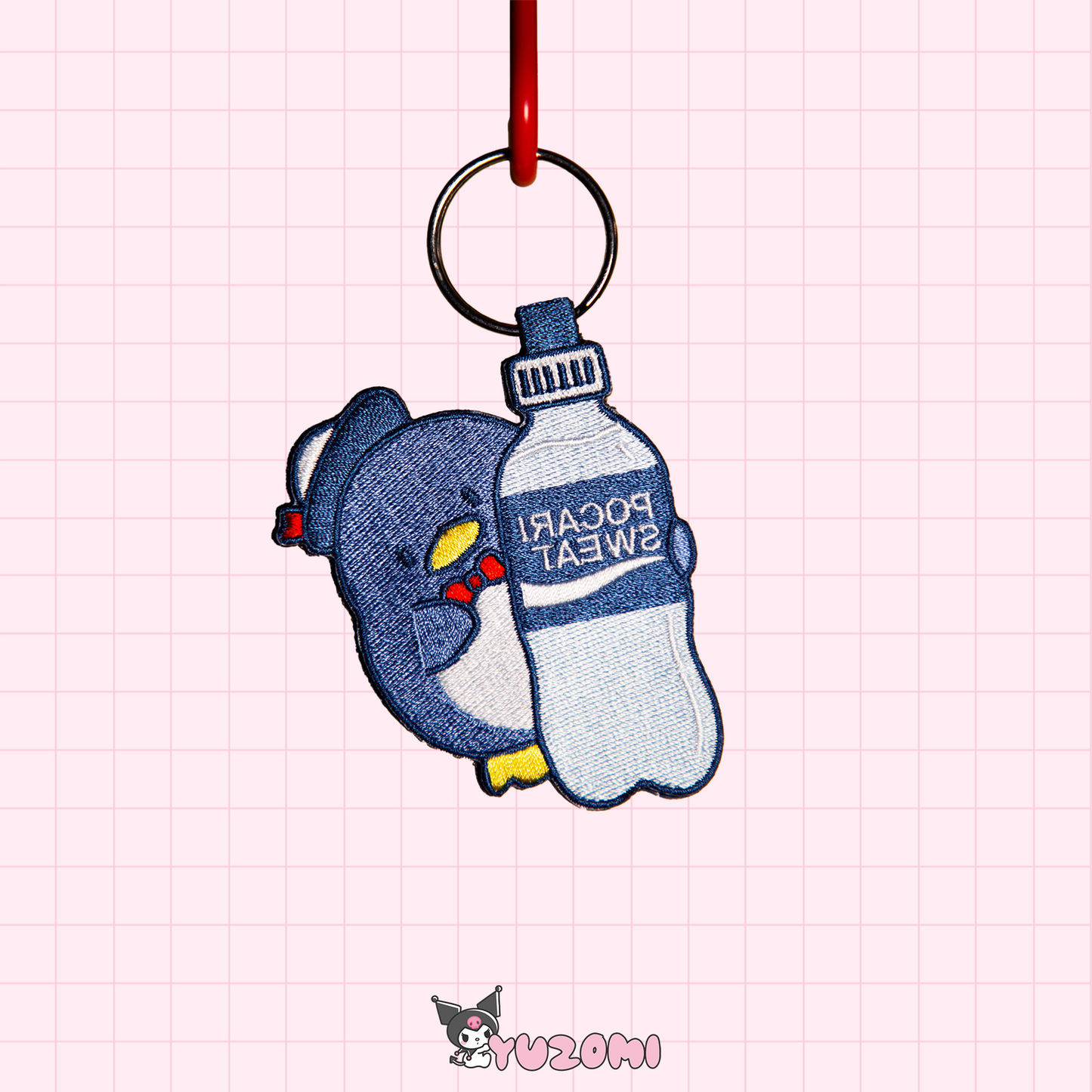 TUXEDO SAM POCARI KEYTAG